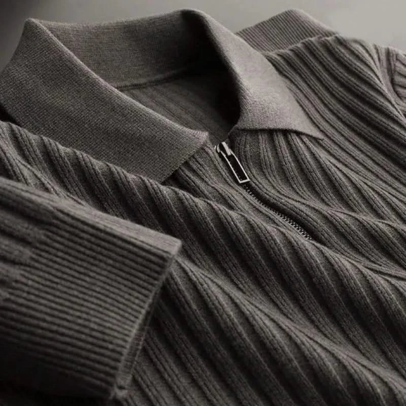 Model wearing a stylish men's long sleeve ribbed knit polo shirt. Cotton blend casual top, comfort fit.