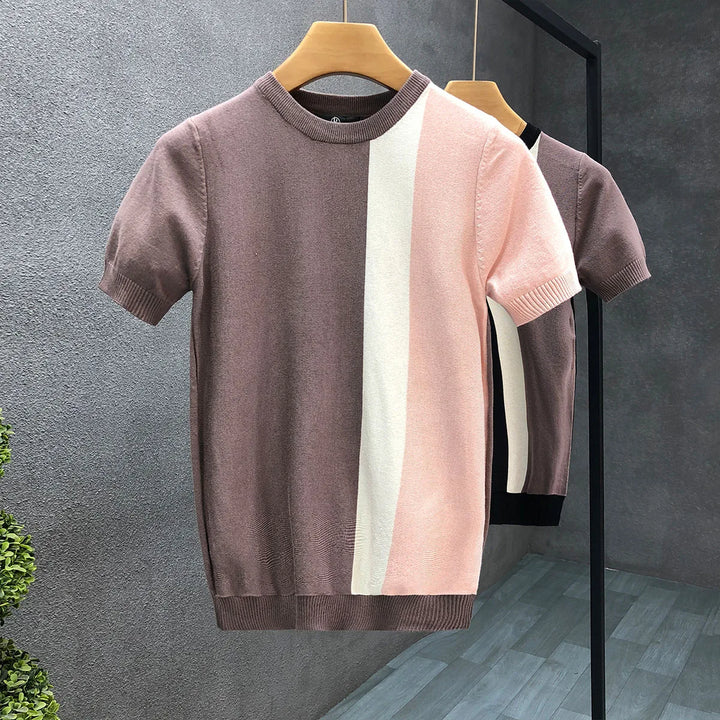 Men's stylish color block crewneck sweater for modern comfort. Features black and pink design, perfect for casual fall wear.