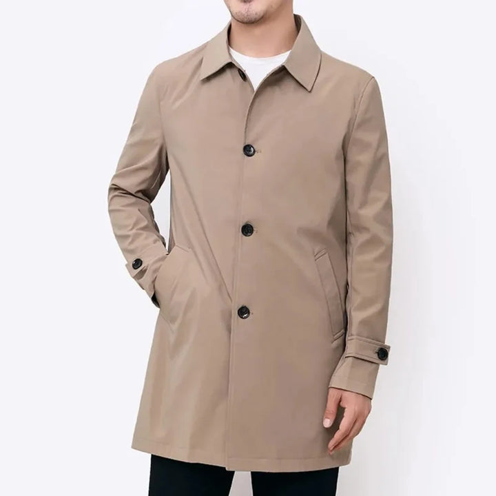 All-season men's water-resistant trench coat. Stylish and durable outerwear for various weather conditions.