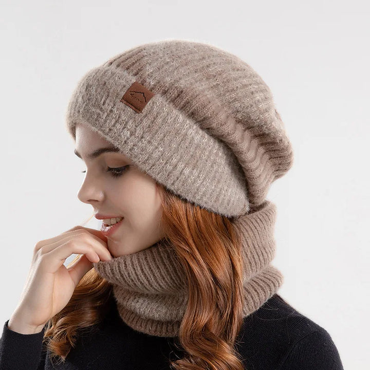 Thick knit unisex beanie hat provides superior head warmth. Paired with a cozy neck gaiter for full winter coverage.