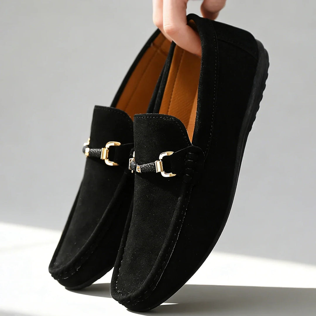Classic men's slip-on loafers with metal buckle, perfect for stylish everyday wear. Comfortable footwear.