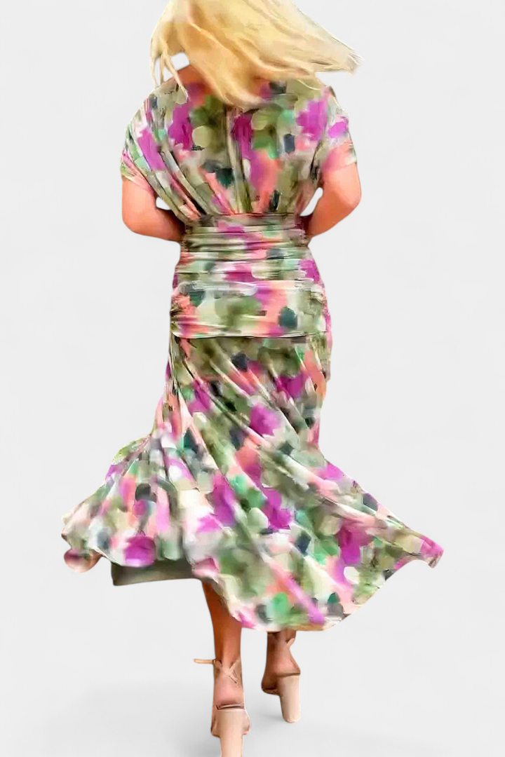 Stylish women's off-shoulder midi dress, featuring a ruched bodice & elegant twist-front detail.