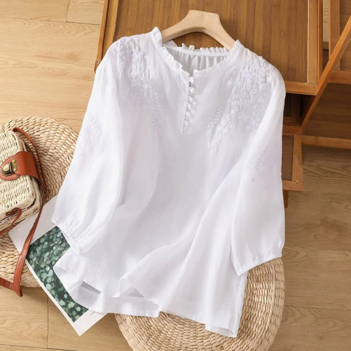 Loose fit women's blouse, elegant embroidered button-front top for comfortable spring & summer casual wear.