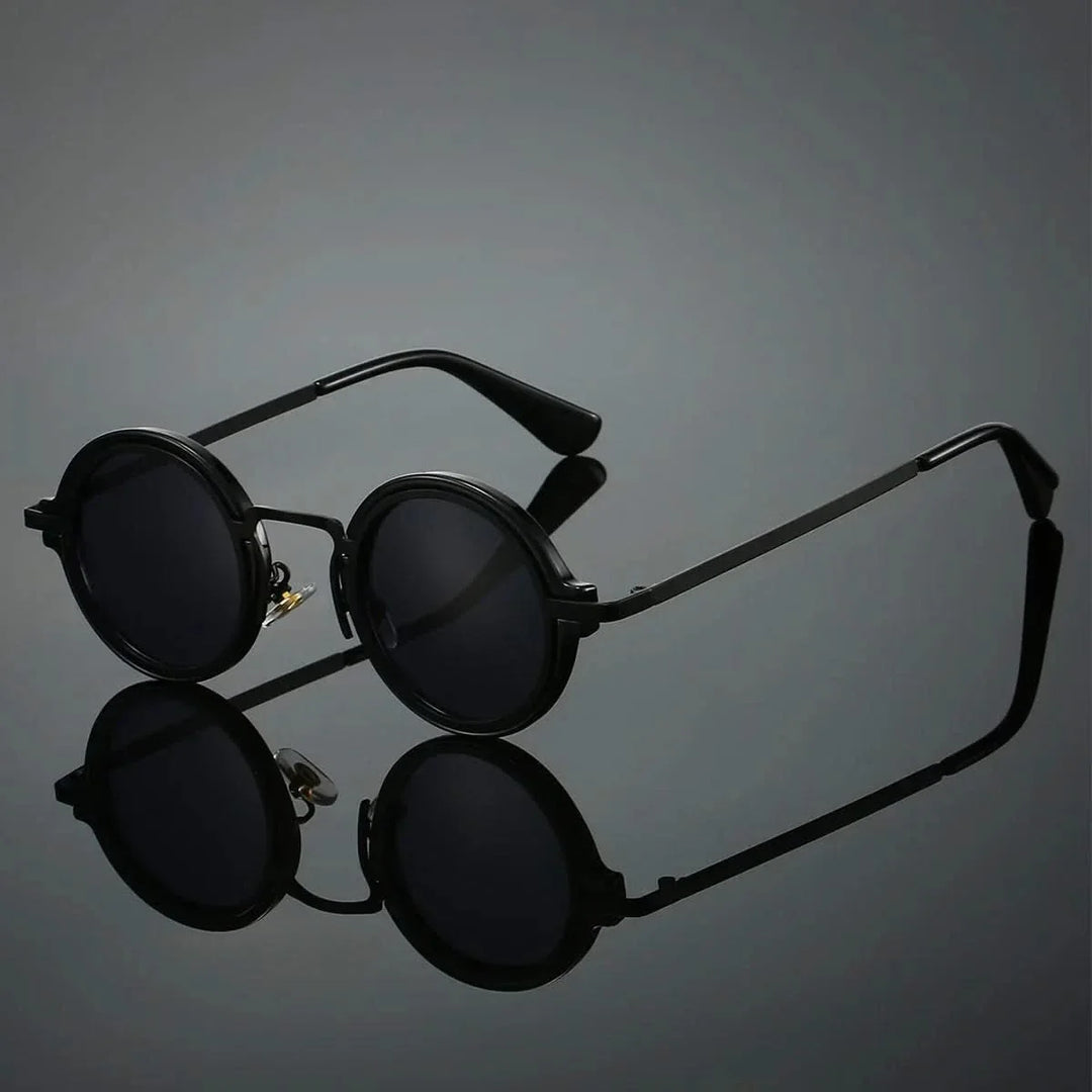 Gold frame vintage round sunglasses, unisex, with anti-glare lenses. Lightweight retro eyewear for sun protection.