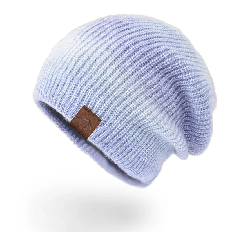 Cozy rainbow knit winter beanie, a colorful and comfortable statement piece for all.