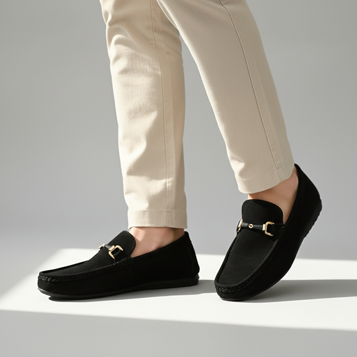 Elegant men's slip-on loafers featuring a shiny metal buckle. Convenient & stylish dress or casual shoes.