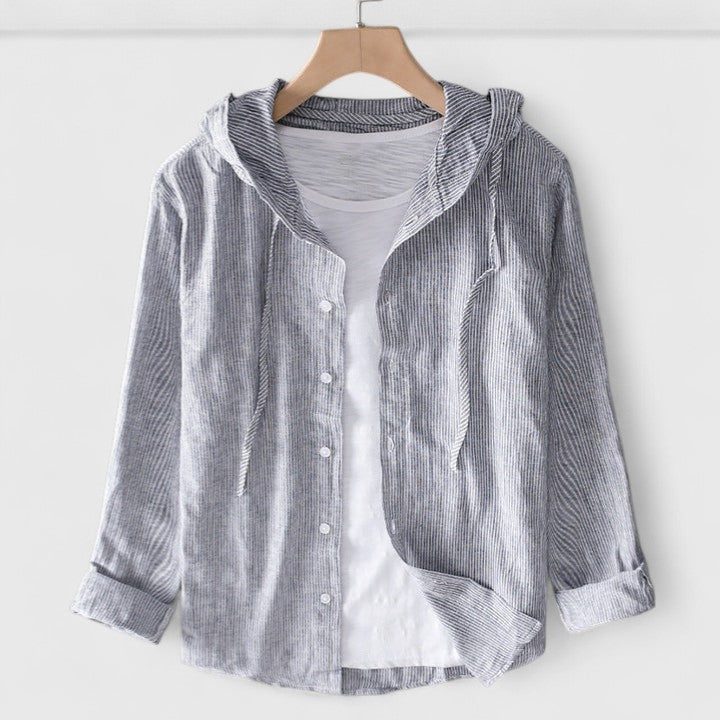 Comfortable women's relaxed-fit blouse, a stylish hooded top with soft drape for everyday casual wear.