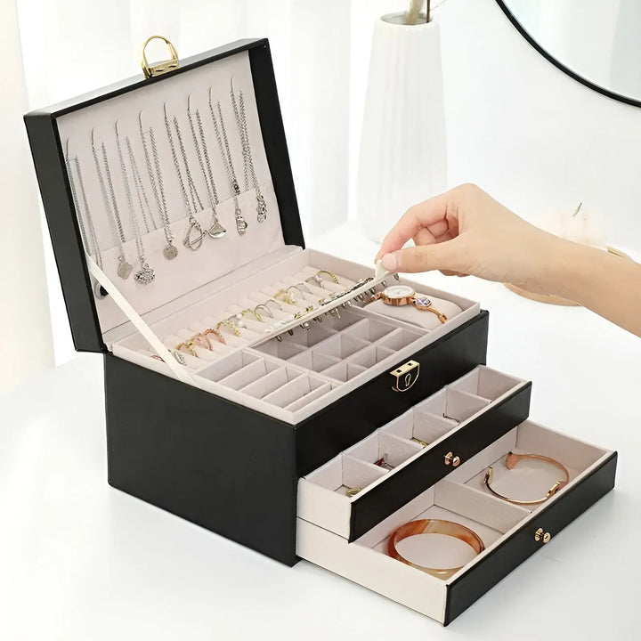 Pink faux leather multi-tier jewelry organizer storage box, elegant vanity decor.