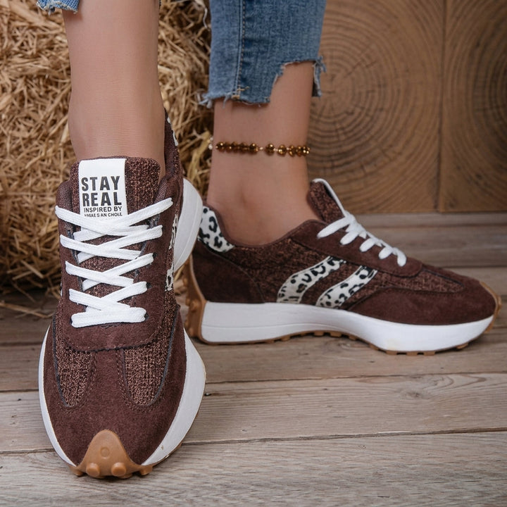 Cushioned women's walking sneakers, lightweight with orthopedic arch support for daily wear.