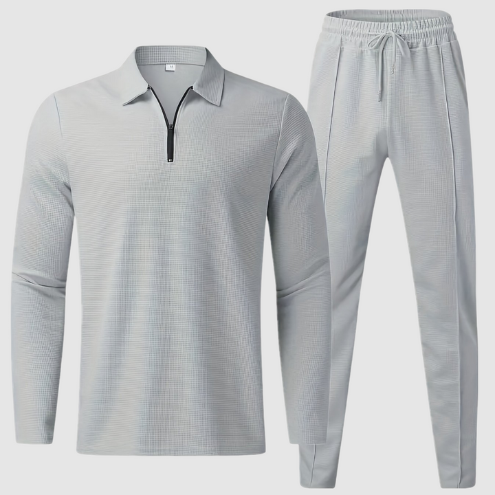 Matching men's textured loungewear set. Includes a cozy sweatshirt & practical drawstring joggers for comfort.