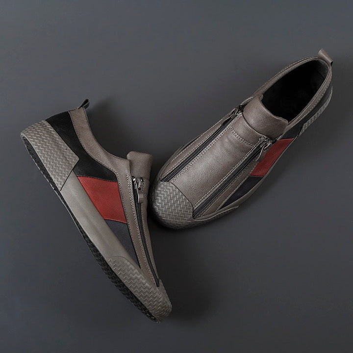 Trendy men's fashion sneakers in a modern color block pattern, cushioned for comfort.