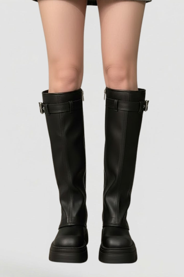 Fashionable brown women's knee-high platform boots. Tall, elegant footwear with a platform heel for winter style.