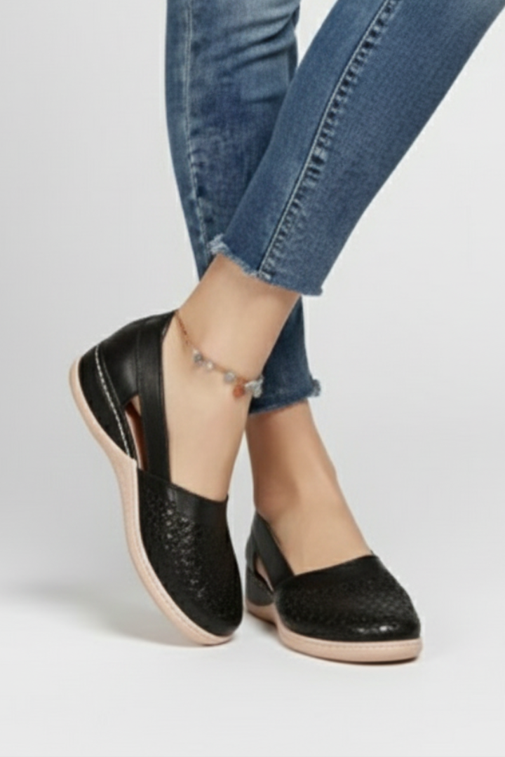 Casual women's flats for spring/summer, featuring elegant cut-outs and a supportive sturdy sole.