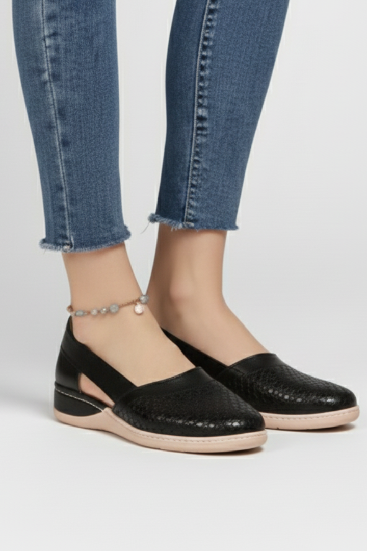 Fashionable women's everyday footwear, versatile flats with unique cut-out design and robust sole.