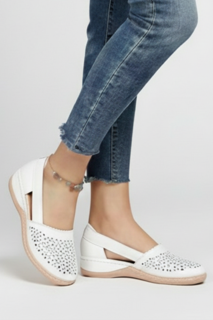 Supportive women's casual shoes with chic cut-outs & sturdy sole, ideal for daily wear and comfort.