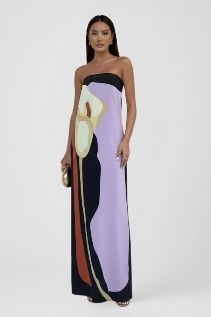 Vibrant abstract patterned women's strapless maxi dress, perfect for vacation, beachwear, and casual elegance.