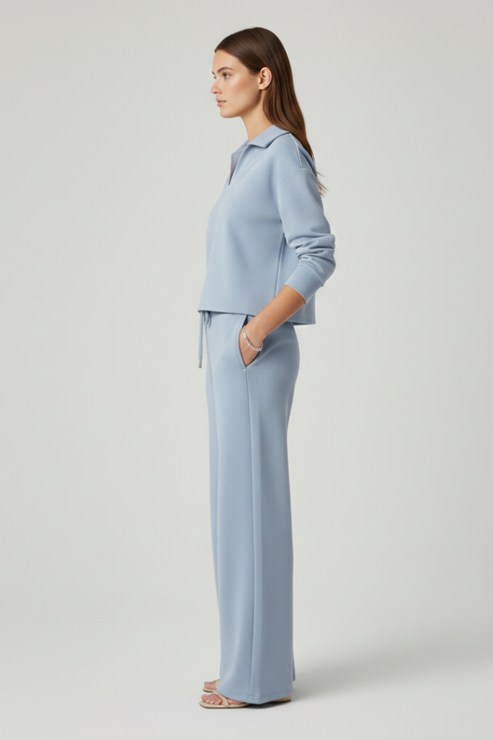 Stylish lounge wear set: women's loose fit v-neck top & matching wide-leg pants for comfort.