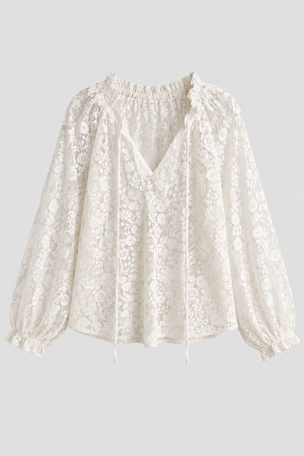 Elegant women's lace top with tied neckline. Versatile long sleeve blouse for chic, feminine fashion.