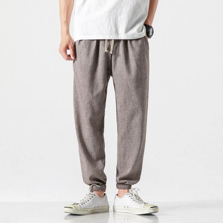 Modern men's summer joggers with drawstring, ideal for casual comfort.