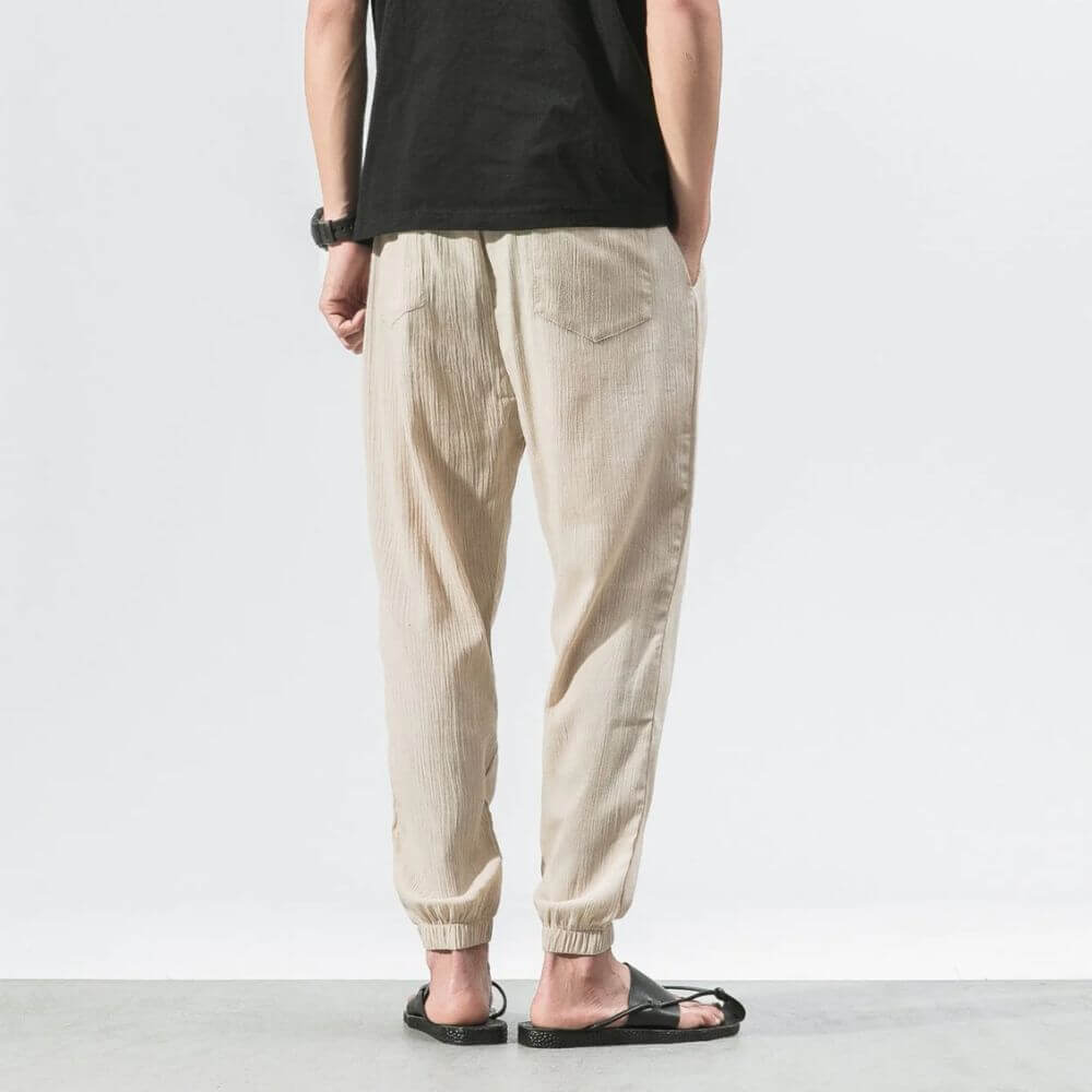 Casual men's summer pants, comfortable drawstring jogger design.