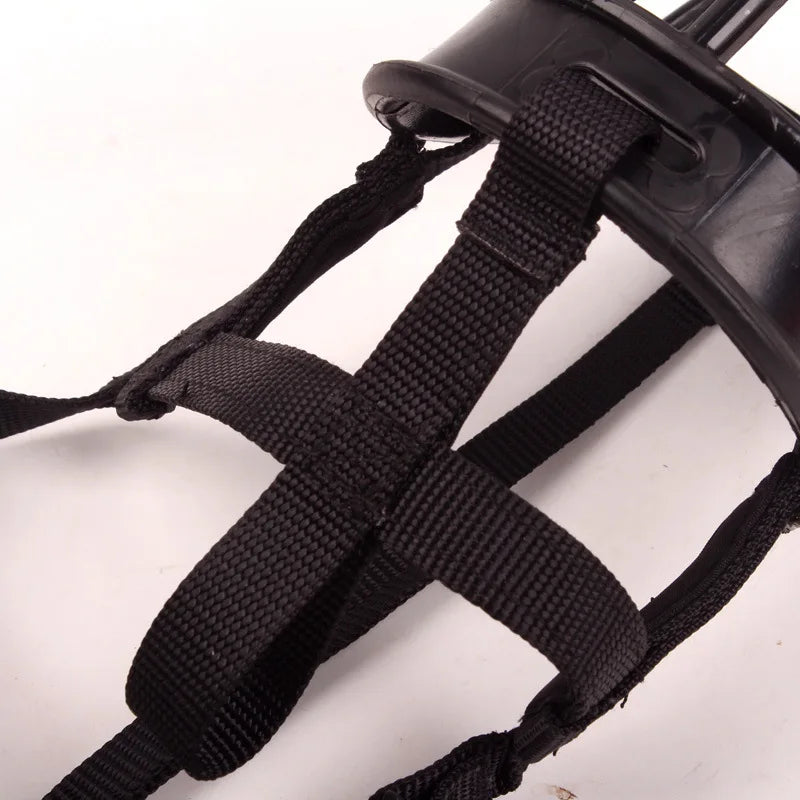 Silicone no-bite dog muzzle, adjustable for effective anti-bark training & safe outdoor walks. A durable pet accessory.