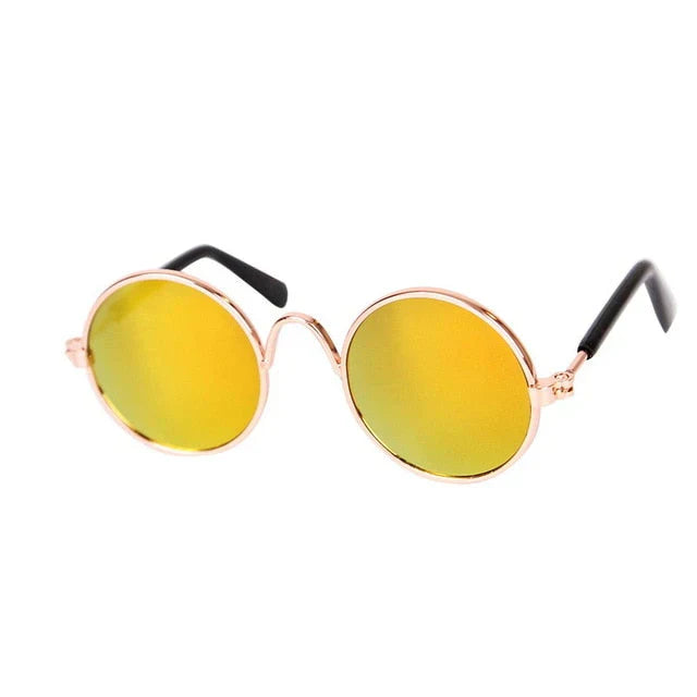 Pet round glasses with reflective lenses, enhancing any pet's fashion statement.