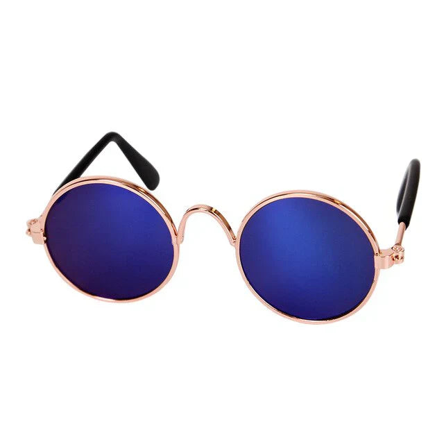 Sleeping cat softly wearing gentle round pet glasses, for ultimate relaxation and style.