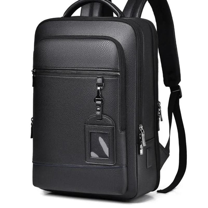 Minimalist design smart USB backpack, a durable PU leather bag for seamless daily commutes.