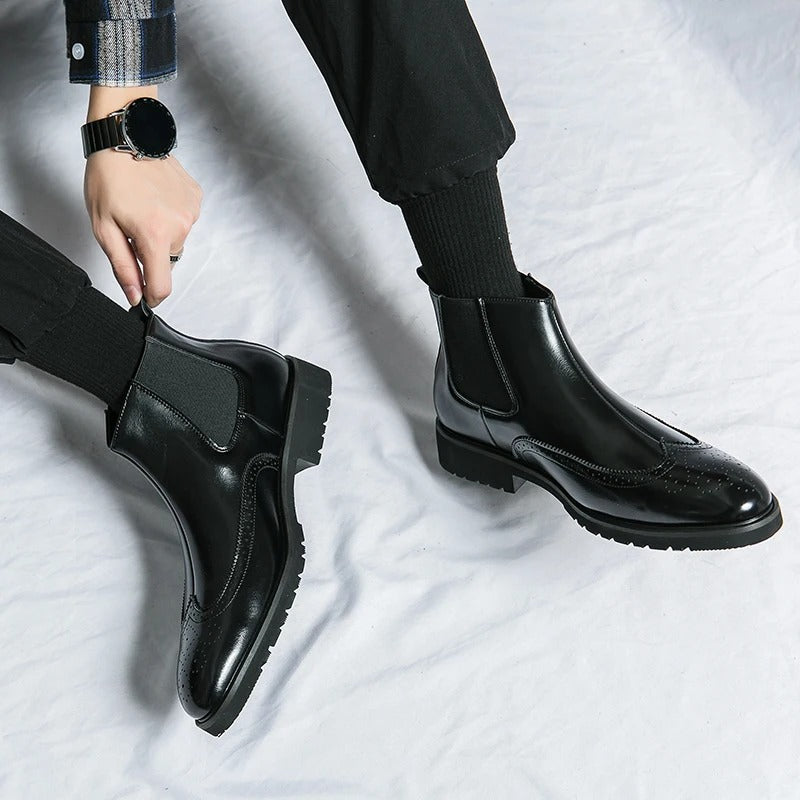 Elegant men's dress chelsea boots, offering comfort and style with refined brogue elements.