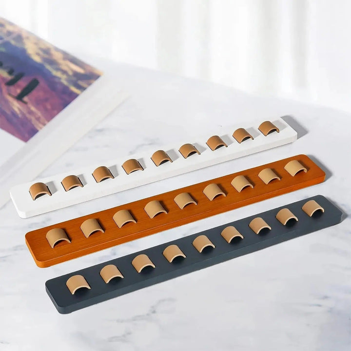 Stylish wooden glasses display rack, space-saving wall organizer for multiple pairs of sunglasses & specs.