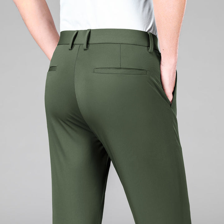 Close-up of the stretch and breathable fabric of men's slim fit performance pants.