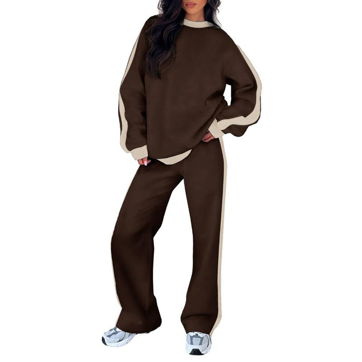 Chic women's wide-leg lounge set, featuring a soft sweatshirt & flowy pants for a relaxed, elegant look.