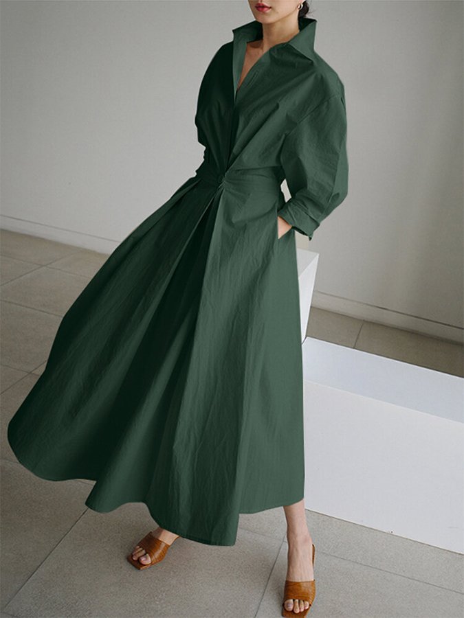 Women's V-neck A-line midi dress, long sleeves. Elegant & comfortable for versatile casual or formal wear.