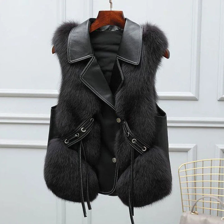 Glamorous women's gilet, a chic winter layering vest. Elegant and versatile sleeveless outerwear piece.