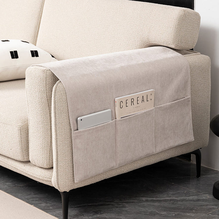 Sofa armrest cover in chenille fabric, acting as a furniture protector with convenient storage