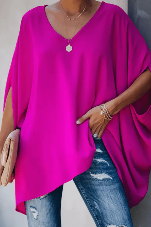 Elegant pink women's pleated top, a versatile V-neck blouse for effortless spring fashion.