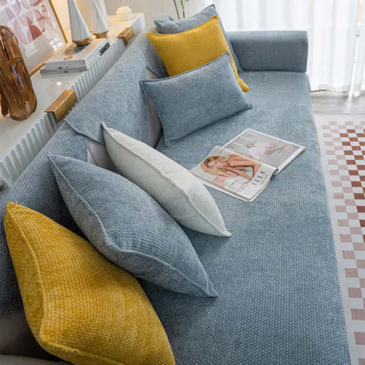 Machine washable, pet-friendly velvet sofa cover in a cloud design for modern home decor.