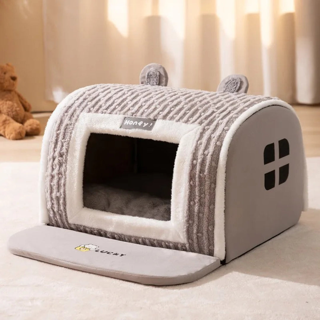 Comfortable dog house bed with a removable roof, offering an enclosed and warm spot for your small pet to rest.