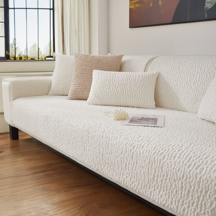 Cream berber fleece sofa cover, a durable and pet friendly solution for furniture protection