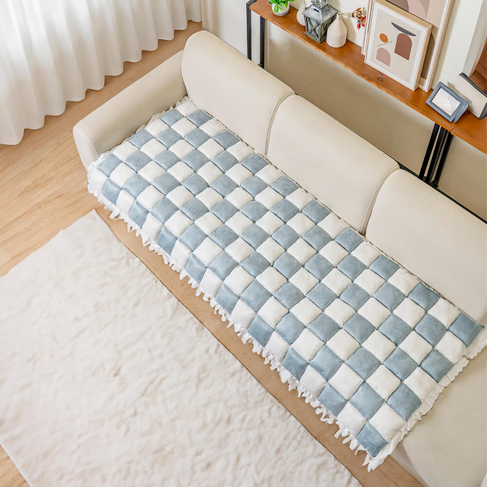 Cream plaid fuzzy pet couch cover with non-slip backing, chenille, a cozy dog bed solution