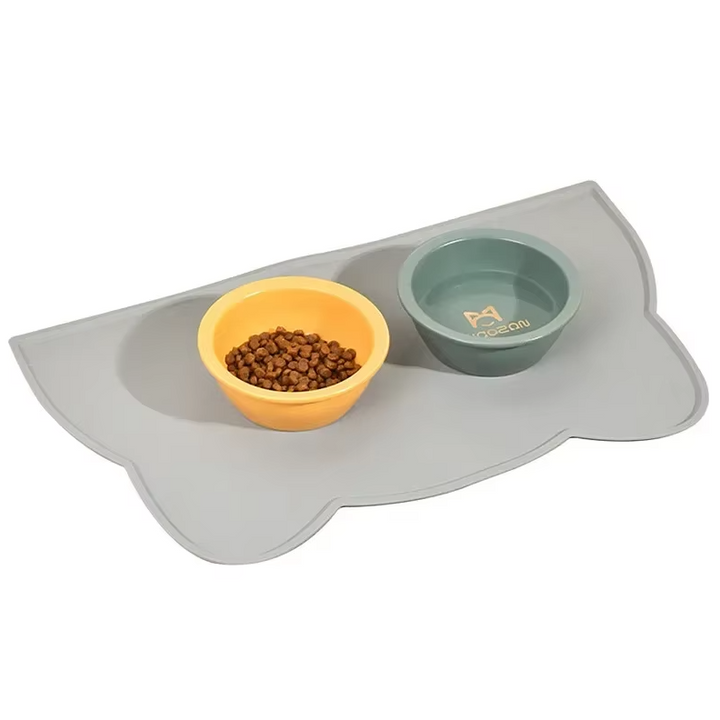 Cat-shaped silicone pet bowl mat, non-slip and easy-clean for a hygenic cat feeding station.