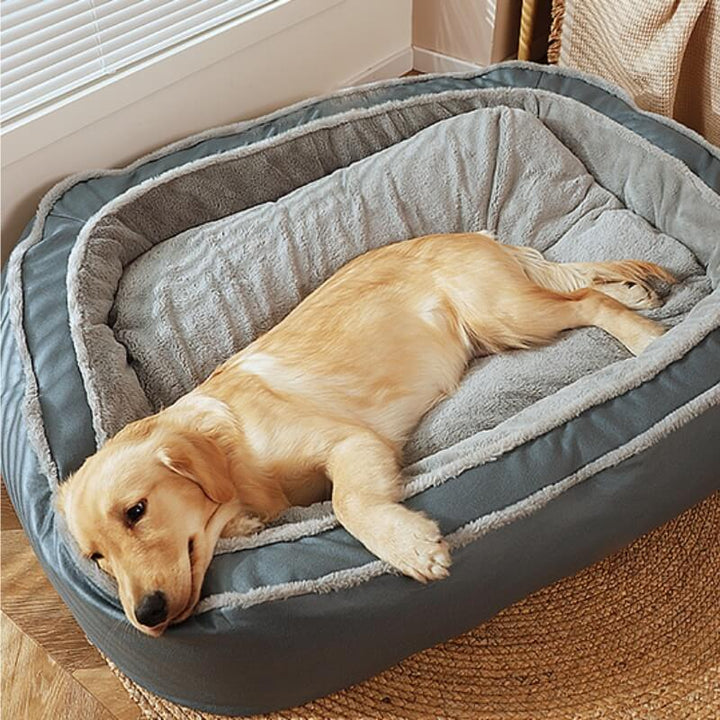 Dark blue orthopedic dog bed, comfortable pet lounger with bolster, washable cover