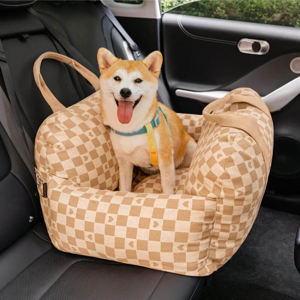 Small dog car seat booster with breathable mesh, keeps pet cool during travel.