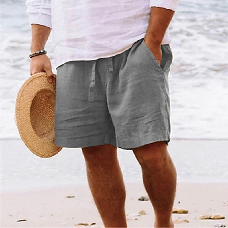 Men's relaxed fit chino shorts with drawstring waistband, showcasing comfort for summer casual wear.