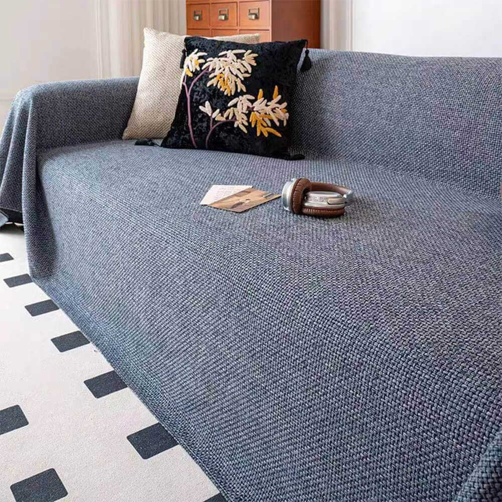 Reversible scratch-resistant linen-look sofa cover. Pet-friendly polyester furniture protector for couches.