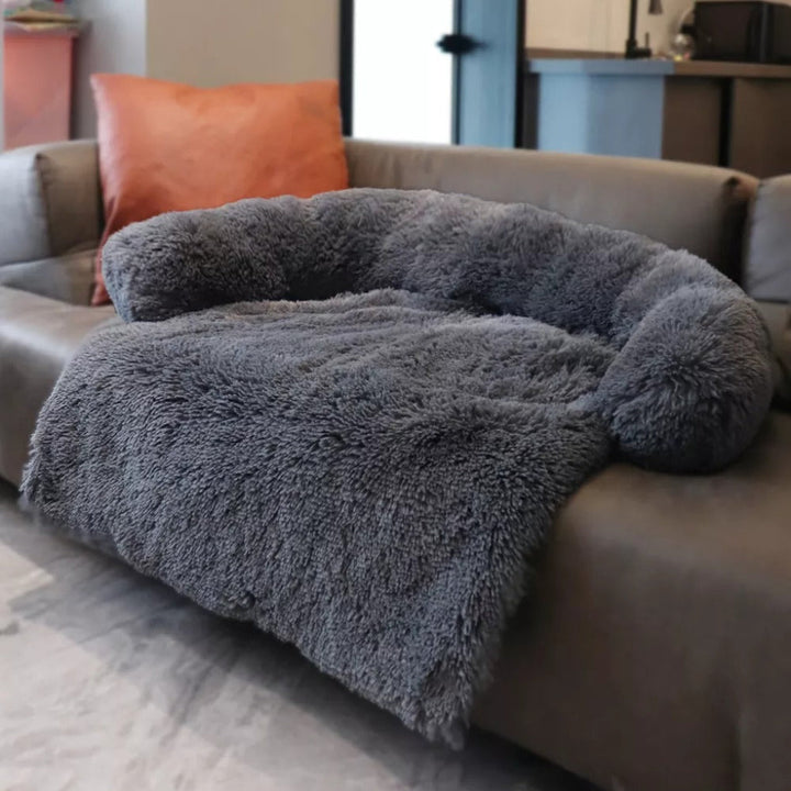 Luxurious anti-anxiety pet couch in dark gray, a comfortable calming dog bed perfect for restful sleep.