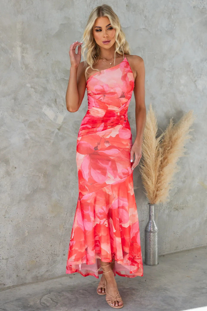 Long women's formal floral dress, ideal for elegant evening wear, summer parties, or wedding guests.