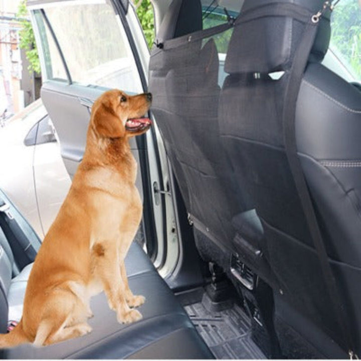 Pet car barrier, mesh vehicle divider for dogs, ensures safe driving and keeps pets secure in the back seat.