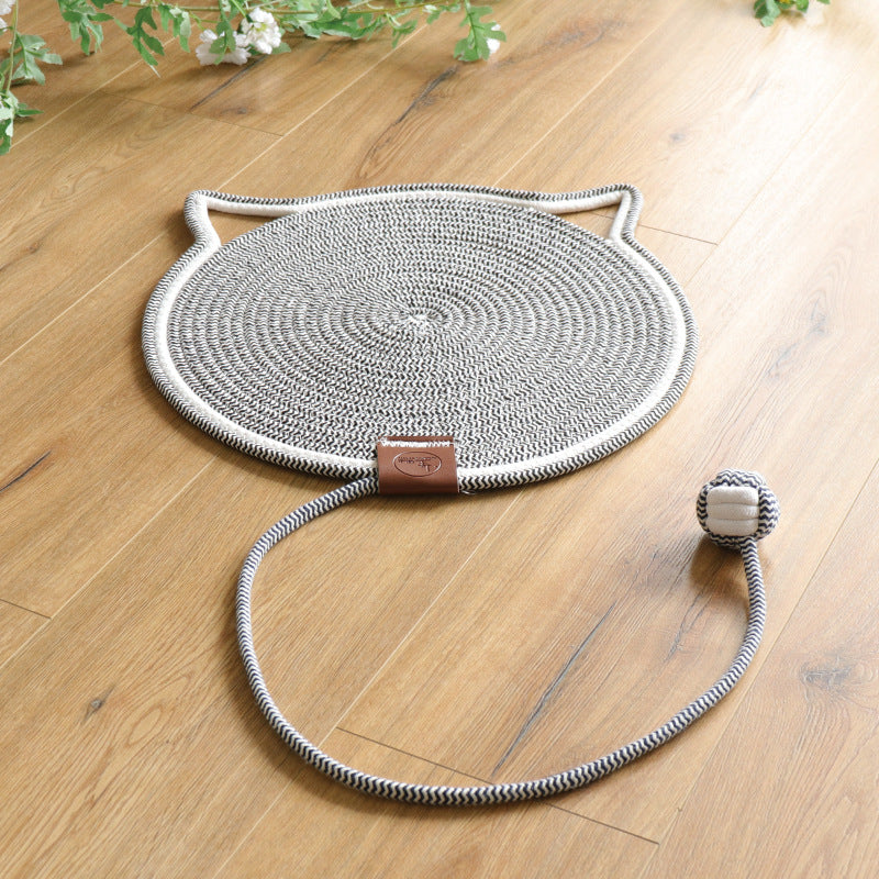 Cat happily lounging on a premium cat scratcher mat, showing its modern design.