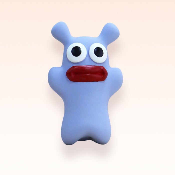 Black monster latex chew toy for powerful chewers, an essential pet supply for playtime